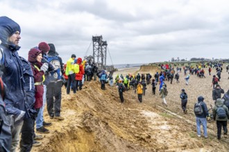 Many thousands of demonstrators march after a demonstration against the demolition of the lignite