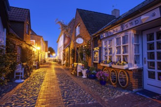 Alley in an old town, twilight, illuminated, Wyk auf Föhr, North Sea island Föhr,