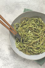 Spaghetti with pesto sauce, homemade, no people