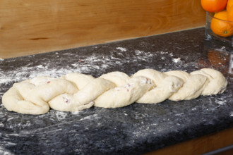 Swabian cuisine, preparation of hearty yeast plait with smoked meat, salty wreath bread, yeast