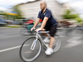 A racing cyclist at the bike parade demo, Berlin, 07 05 2023