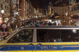 Police car in front of the Nuremberg Christmas Market, Nuremberg, Middle Franconia, Bavaria Germany