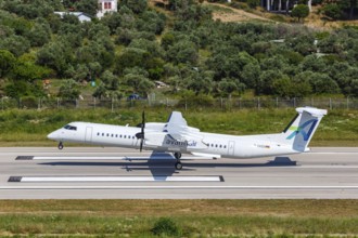 A De Havilland Dash 8 Q400 aircraft of Avanti Air with the registration D-AASH at Skiathos Airport,