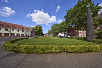 Small green area with Marian column in Dülmen, Münsterland, Coesfeld district, North