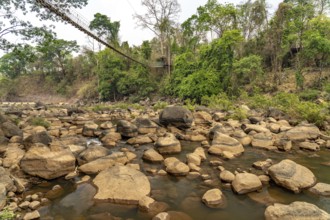 Suspension bridge over the Tad Lo River, Bolaven Plateau, Laos, Asia