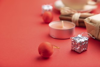 Christmas or New Year composition. Decorations, box, cinnamon, fir and spruce branches, cup of