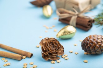 Christmas or New Year composition. Decorations, box, cinnamon, cones, fir and spruce branches, on a