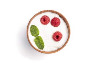 Yogurt with raspberry in clay cup isolated on white background. top view, flat lay, close up