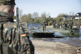 German soldiers of the NATO Response Force (NRF) train a water crossing with amphibious vehicles as