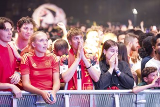 Fans of the Spanish team fear after the equalising goal by England at the Adidas fan zone at the