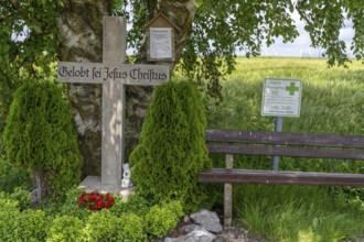 Wind farm north of Marsberg, wayside cross, park bench and emergency sign, rescue point,