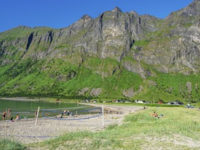 Beach Ersfjordstranden, fjord Ersfjord, public recreation area, beach volleyball, view to mountain