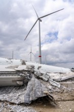 Demolished tower of a 20 year old wind turbine, in the Werl wind farm, 5 old Enercon E-66 turbines