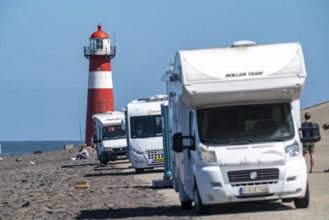 North Sea dyke near Westkapelle, Westkapelle Laag lighthouse, motorhome parking on the dyke, day