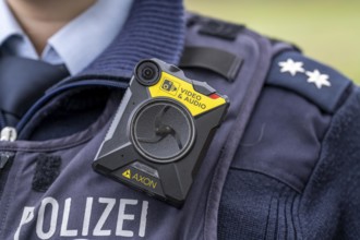 Police, policewoman with equipment waistcoat, bodycam, North Rhine-Westphalia, Germany, Europe