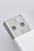 Close-up of a USB type A plug on a white background