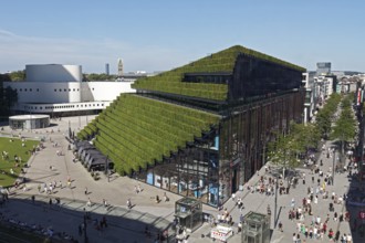 View of Kö-Bogen II, with green façade, planted with 30, 000 hornbeams, ecological architecture to