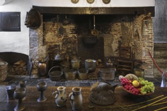 Kasteel van Laarne, interior showing kitchen and open fireplace inside 14th century medieval moated