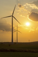 Wind farm, wind turbine, wind turbines, in front of sunset, storm clouds, Swabian Alb,