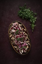 Kuchmachi, Traditional Georgian cuisine, chicken giblets appetizer, with spices and pomegranate