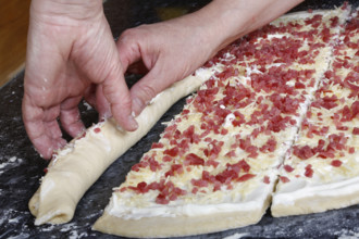 Swabian cuisine, preparation of savoury yeast plait with smoked meat, salty wreath bread, yeast