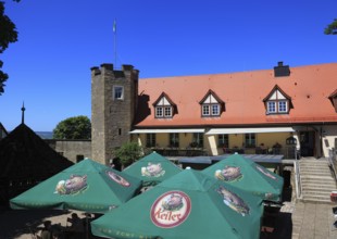 Sunshades of the beer garden on the castle ruins on the Schlossberg, Königsberg in Bavaria,