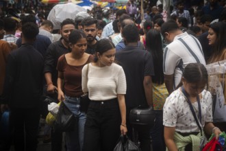 Crowd of people to shop at a street market ahead of Durga Puja festival on October 7, 2024 in