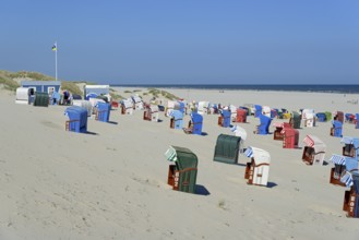 Colourful beach chairs on the beach, blue sky, North Sea, Juist, East Frisian Islands, Lower