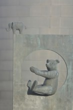 Two grey sculptures with bear figure and elephant figure, Steiff animals, teddy bear, bronze