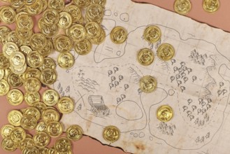 Pirate treasure map with toy gold coins for children