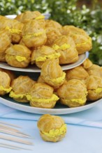 Swabian cuisine, mini cream puffs filled with goat's cream cheese, cream cheese éclairs,