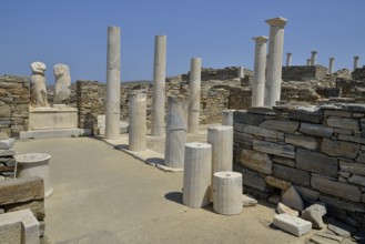 Ancient statues and columns, Cleopatra and Dioscorides, torsos with no heads, Delos island, UNESCO