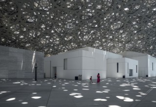 Visitors in the light rain of the Louvre Abu Dhabi, architect Jean Nouvel, Saadiyat Island, Abu