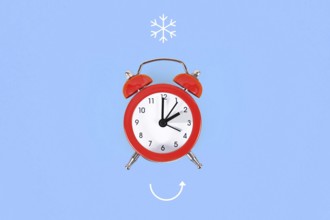 Concept for explaining winter daylight saving time with clock and arrow