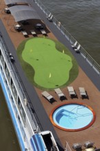 Artificial lawn with putting green, golf training on a river cruise ship on the Rhine, Düsseldorf,