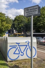 Bicycle boxes at a bus and tram stop in Essen, commuters can rent the boxes and park their bikes