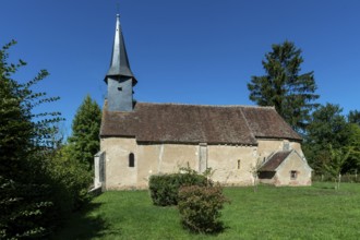 The land of Troncais. Isle-et-Bardais village. 13th century church of Saint-Laurent. Allier