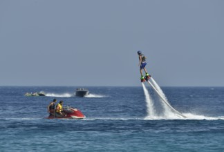 Water sports on the Super Paradise Beach, water jetpack, Mykonos, Cyclades, Greece, Europe