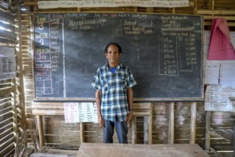 Local teacher in a school in the village of Upovia, Lake Murray, Western Province, Papua New