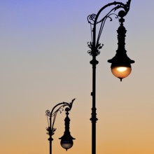 Old Berlin gas lanterns in the street Unter den Linden At sunset, Berlin, Germany, Europe