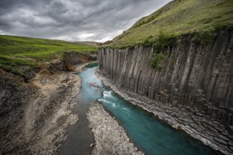 Stuðlagil Canyon, turquoise river between basalt columns, Egilsstadir, Iceland, Europe