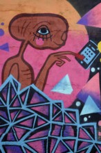 Graffito of extraterrestrial, mural painting, Lisbon, Portugal, Europe