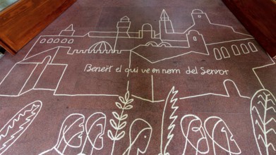 Drawings and painting on the floor at the entrance to the Sagrada Familia, Barcelona, Catalonia,