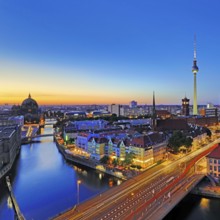 City panorama with Spree, Cathedral, Nikolai Quarter, Red City Hall and TV Tower in the evening,