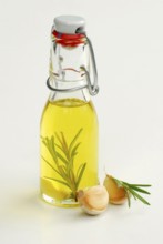 Herbal oil, olive oil with rosemary and garlic, olive oil