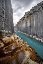 Stuðlagil Canyon, turquoise river between basalt columns, Egilsstadir, Iceland, Europe