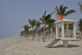 Red flag, bathing is prohibited, on Salalah Beach, Salalah, Dhofar Region, Oman, Asia