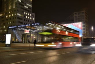 Double-decker bus at Potsdamer Platz square at night, Berlin, Germany, Europe