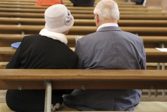 Faithful couple in a church service