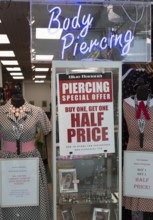 Body piercing offer at Blue Banana inside shopping mall, Brunel Centre, Swindon, Wiltshire,